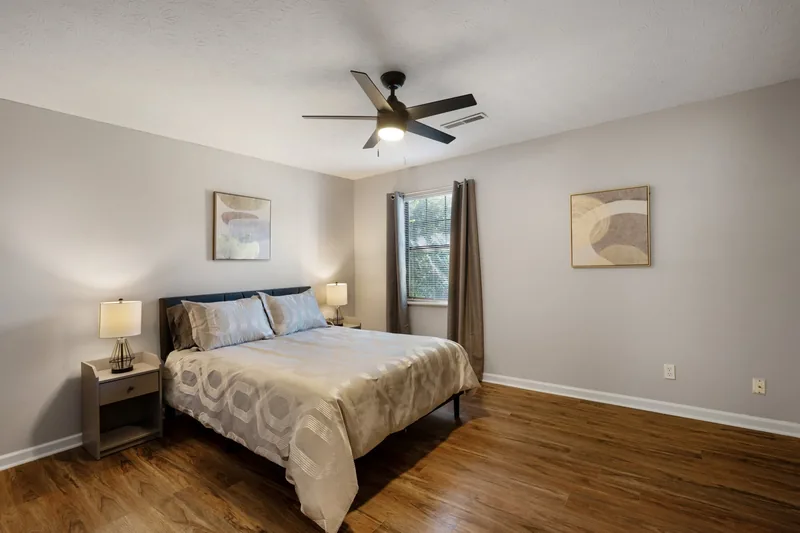 Master bedroom with hardwood floors